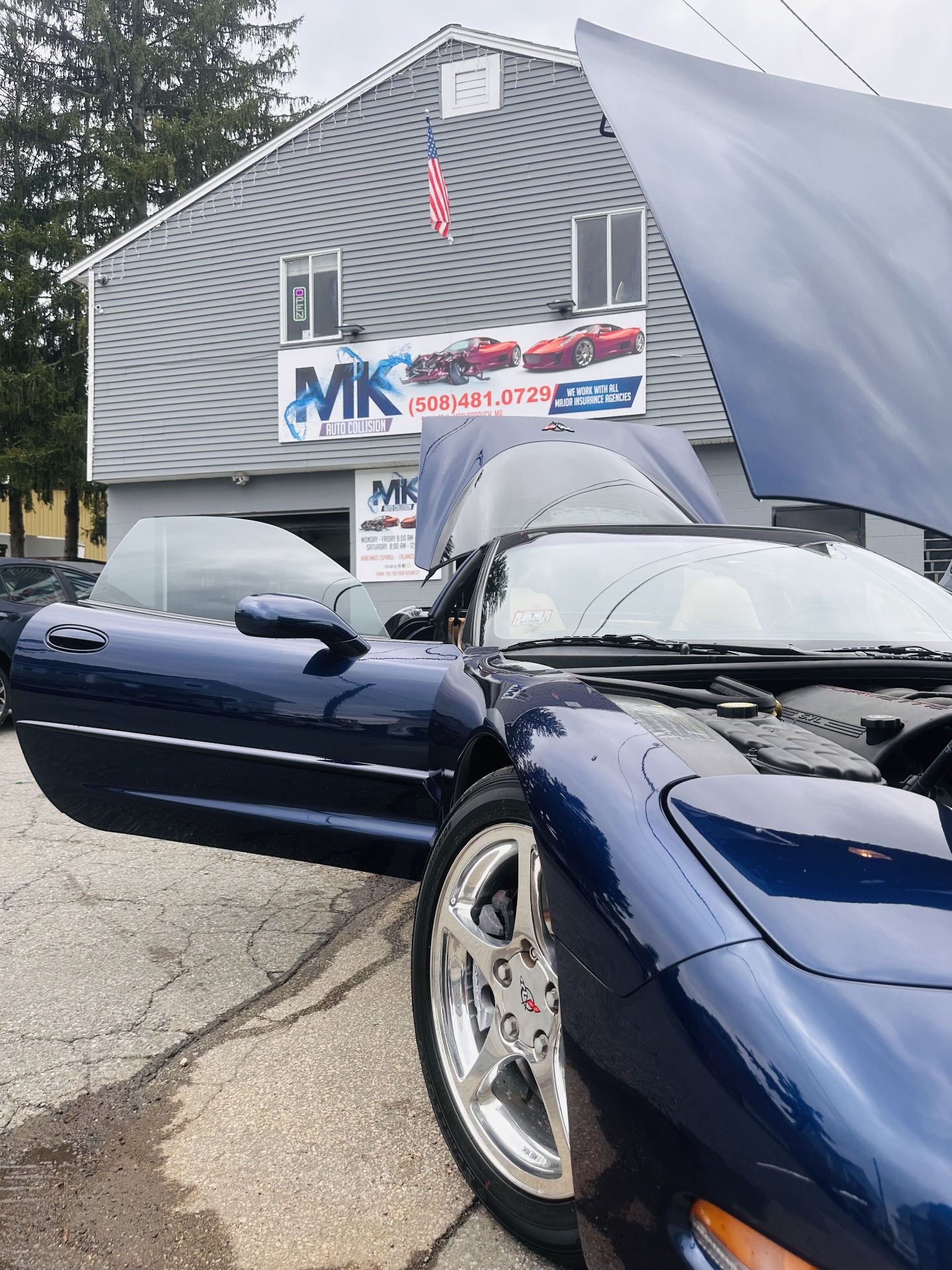 Blue Corvette getting serviced at MK Auto Collision