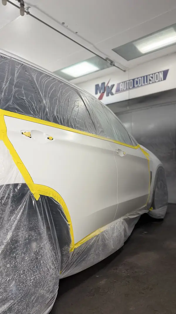 Sedan panel alignment after frame straightening
